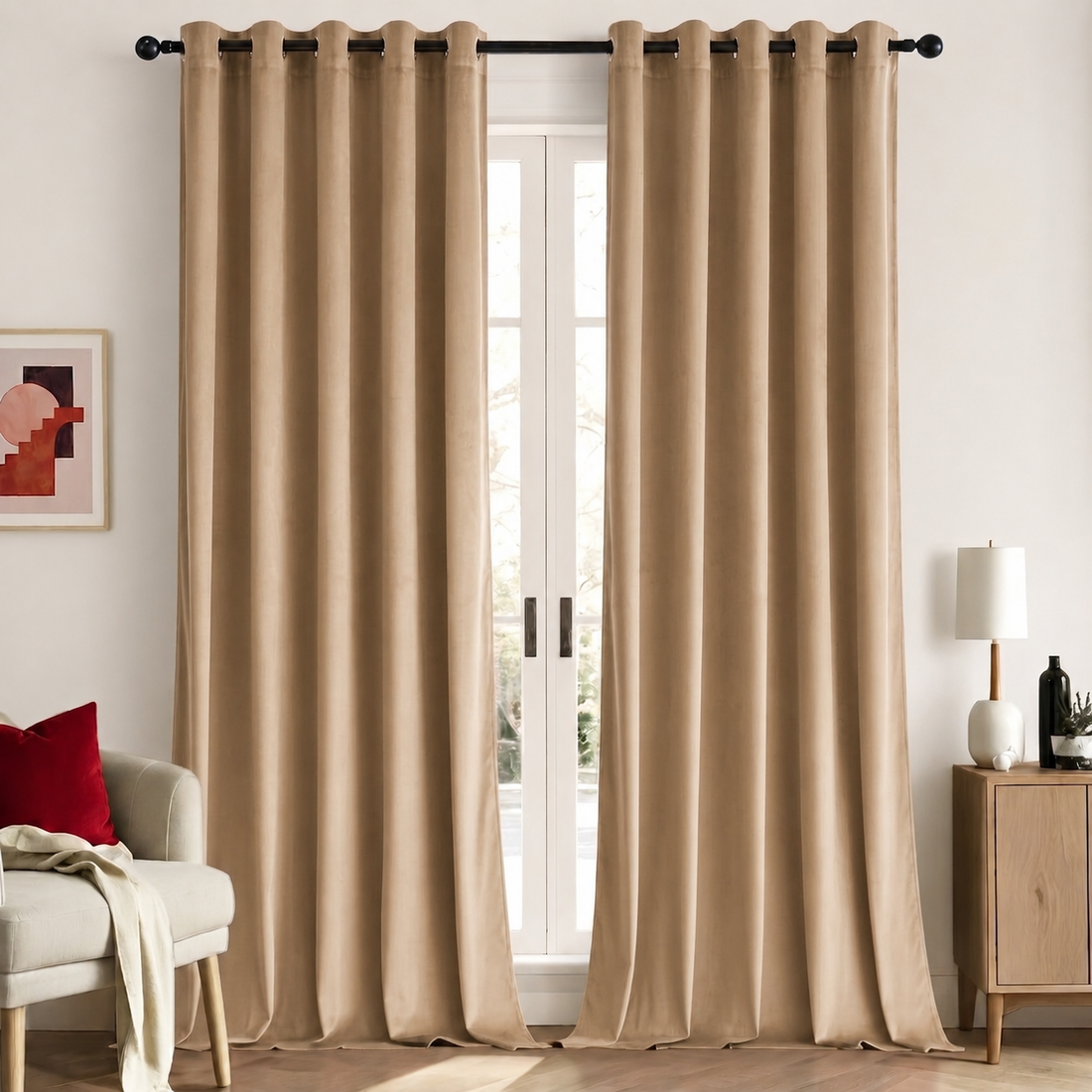 Camel brown velvet room-darkening curtains, set of 2, hanging on a black rod in a bright living room
