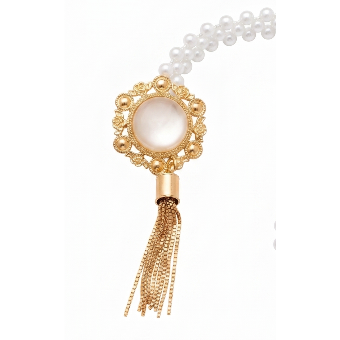 Two opalescent pearl curtain tiebacks gathering white curtain panels either side of a window